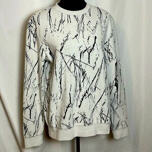 H & M  cream sweatshirt with abstract splatter patterns S